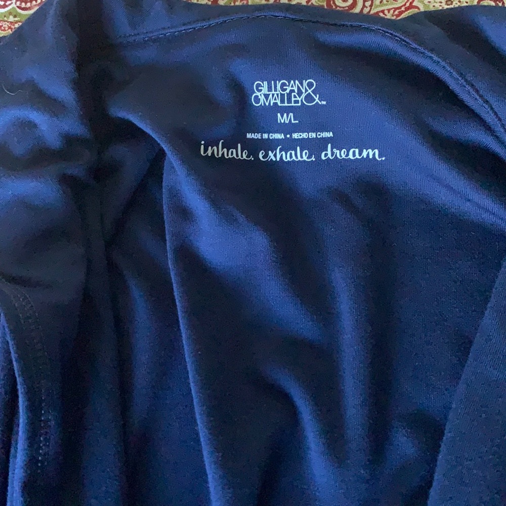 Never been worn, dark blue robe.
